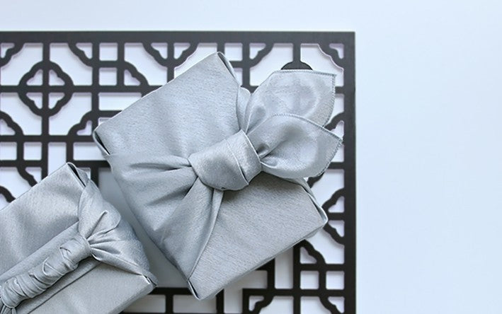 bojagi gift wrap silver,  ivory background